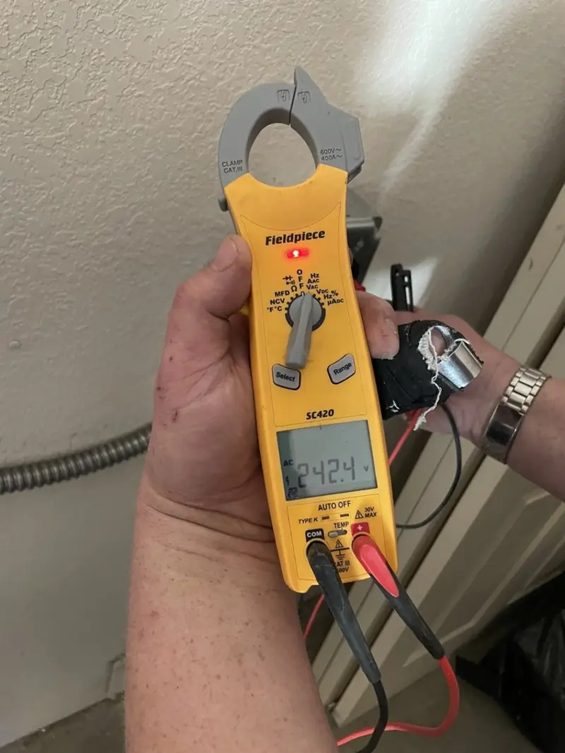 Voltage testing with clamp meter during Hot Tub / Pool Electrical Wiring in Walthourville